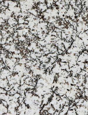 Close up of the stone of the Sumalee sculptural solid marble coffee table.