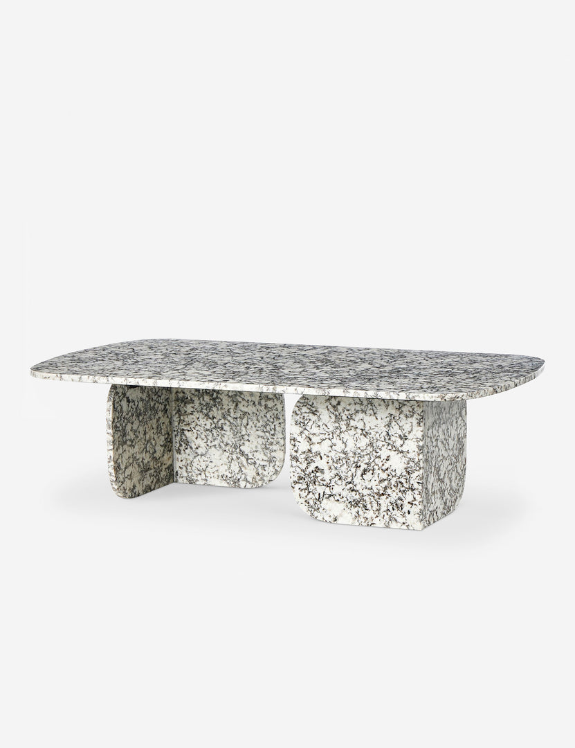 #color::speckled-black-marble | Sumalee sculptural solid marble coffee table.