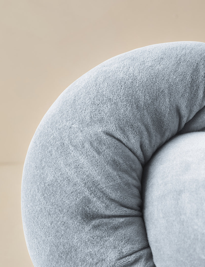 #color::ice-blue | Close up of the Dewey velvet knot ball pillow.