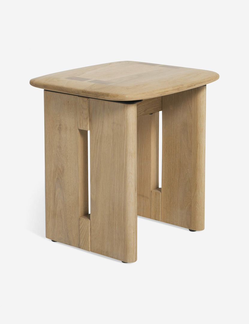 | Angled view of the Henrik light wood stool