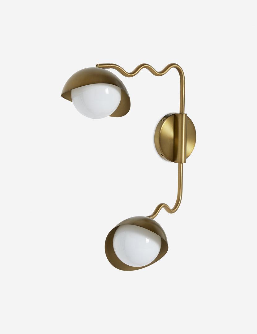 #color::brass | Side view of the Kukka modern wavy adjustable two arm wall sconce in brass