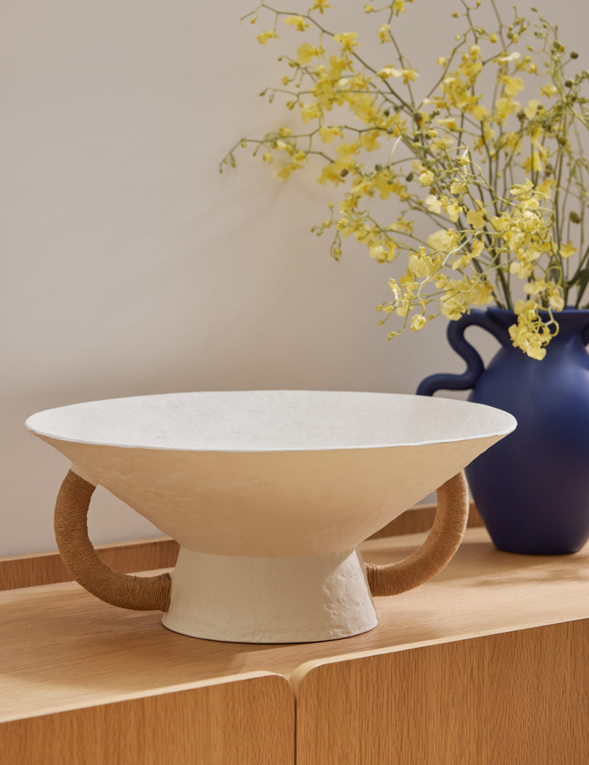 #color::white | Olea modern decorative pedestal bowl styled on a sideboard cabinet.