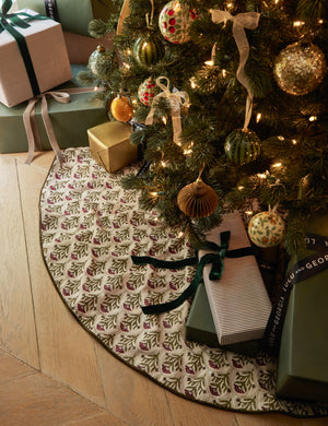 Christmas tree with presents on the Dov floral pattern tree skirt