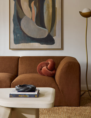 Sofa styled with the Dewey velvet knot ball pillow.