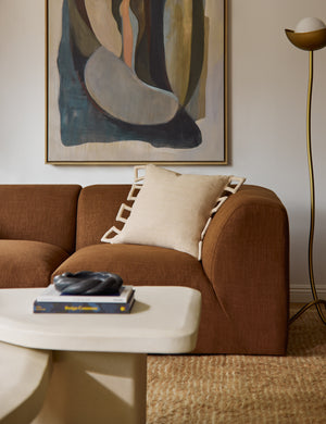 Sofia modern linen throw pillow styled on a sofa.