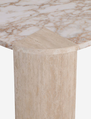 Close up of the Mahoe oval marble and travertine coffee table by Carly Cushnie.