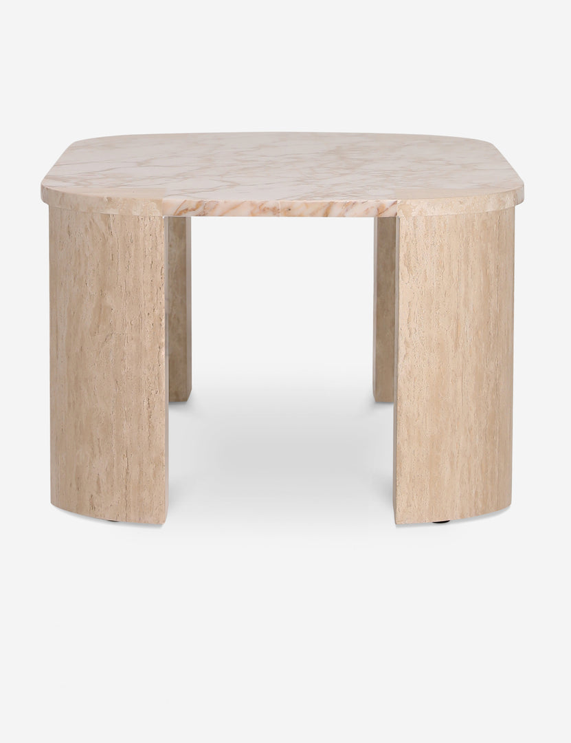 #color::travertine-and-marble | Side profile of the Mahoe oval marble and travertine coffee table by Carly Cushnie.