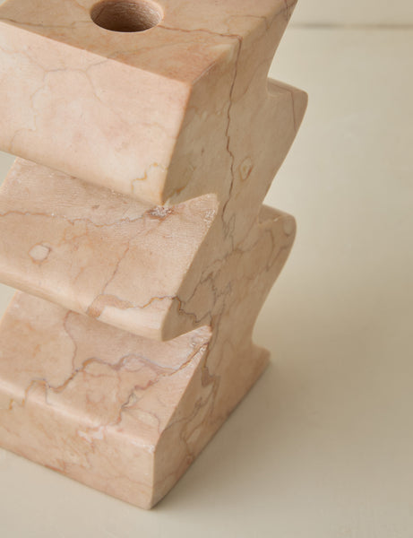 #color::pink | Close up of the Mischa sculptural marble taper candle holder.