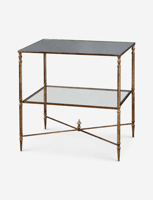 Angled view of the Nicolina side table with mirrored top and gold finish