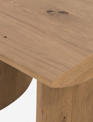 Close up of the top corner of the Remwald sculptural oak wood square side table.