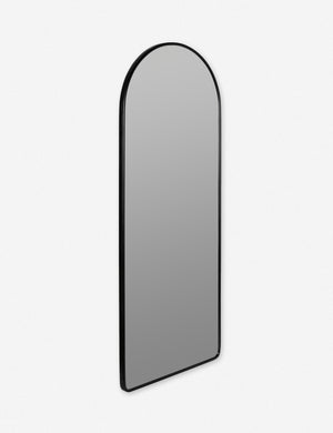 Angled view of the Shashenka black arched floor mirror