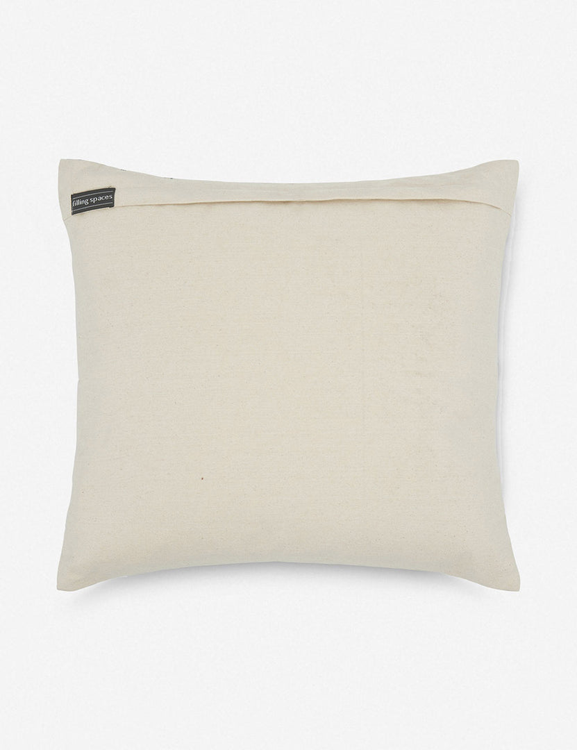 | Rear view of the Skylar cream, blue, and black square pillow with geometric stitching