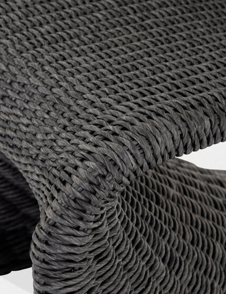 #color::Vintage-Coal  | Detailed shot of the black woven wicker on the Manila wicker weave black indoor and outdoor dining chair