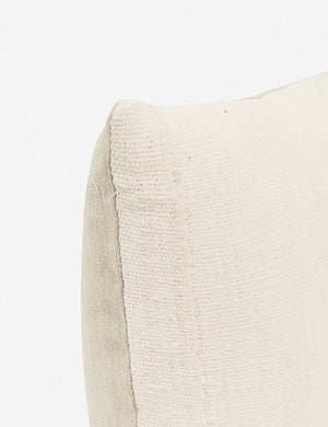 The corner of the Norala solid white handmade lumbar throw pillow